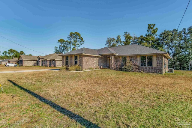 single story home featuring a front yard