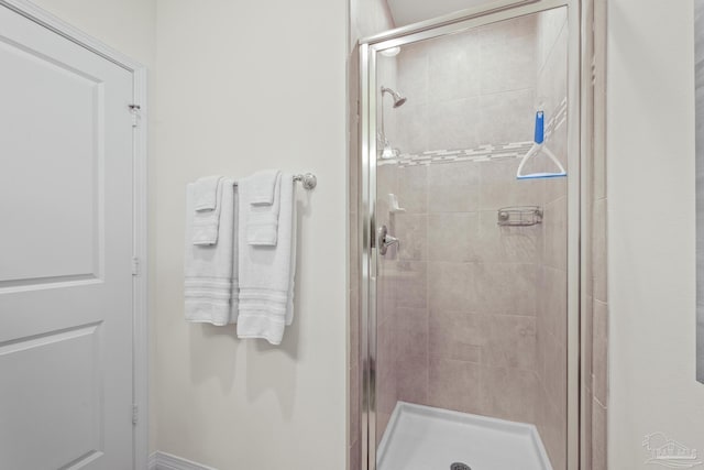 bathroom with a stall shower