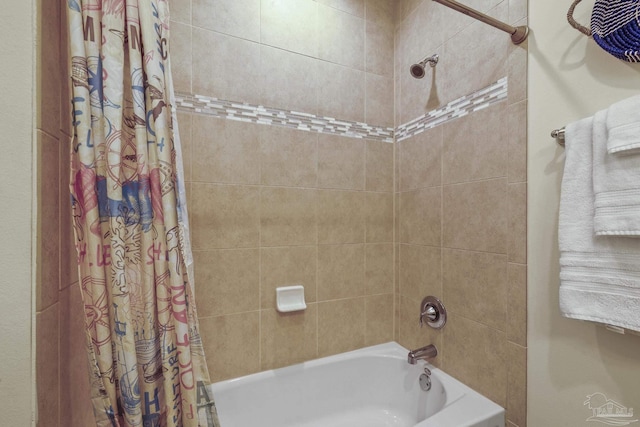 bathroom with shower / bathtub combination with curtain