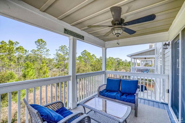 exterior space with a ceiling fan