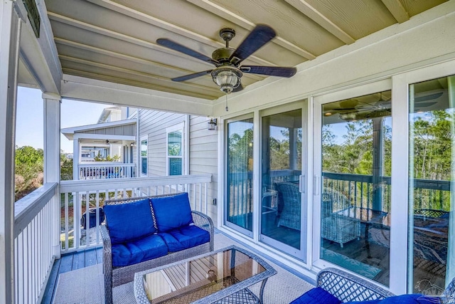 exterior space featuring a ceiling fan