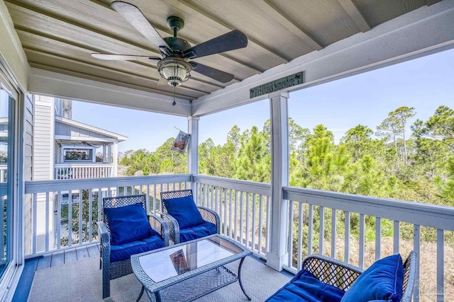 balcony featuring ceiling fan