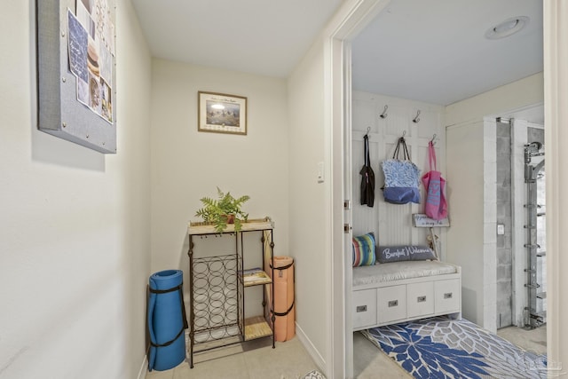 mudroom featuring baseboards