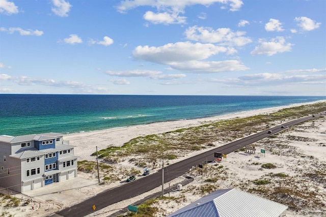 property view of water featuring a beach view