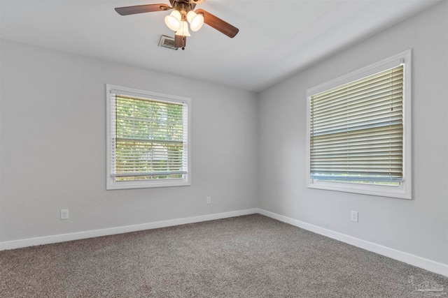 carpeted empty room with ceiling fan