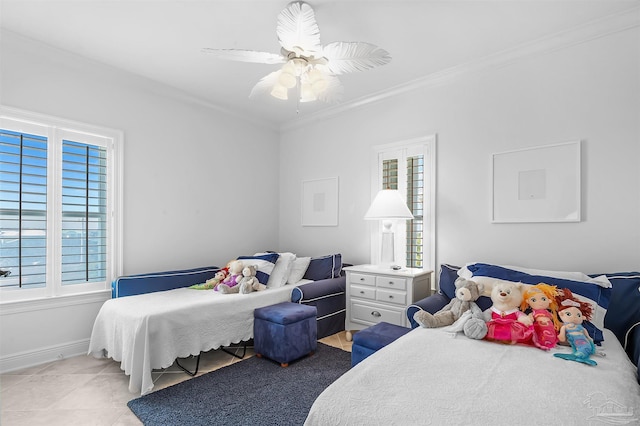 tiled bedroom with ornamental molding and ceiling fan