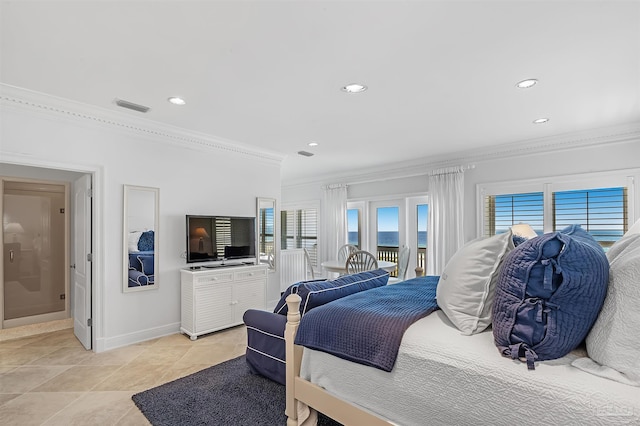 bedroom with light tile patterned flooring and ornamental molding