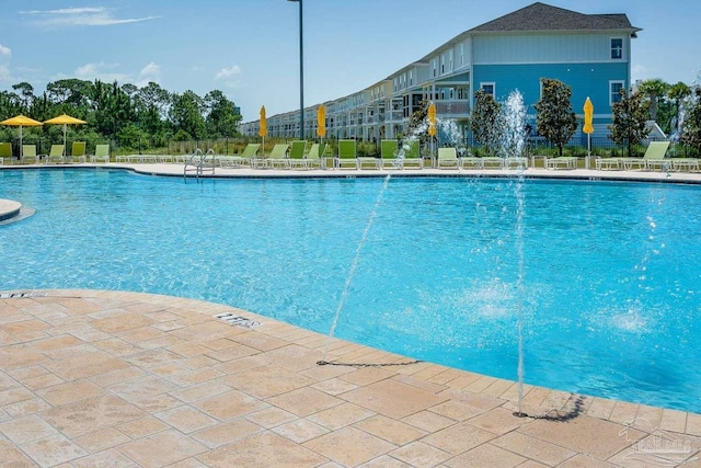 14390 Cordgrass Ln, Pensacola, FL 32507 - community pool featuring a patio