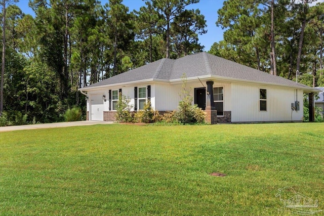 single story home with a garage and a front yard