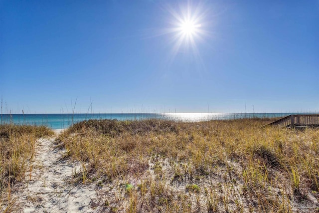 water view featuring a beach view