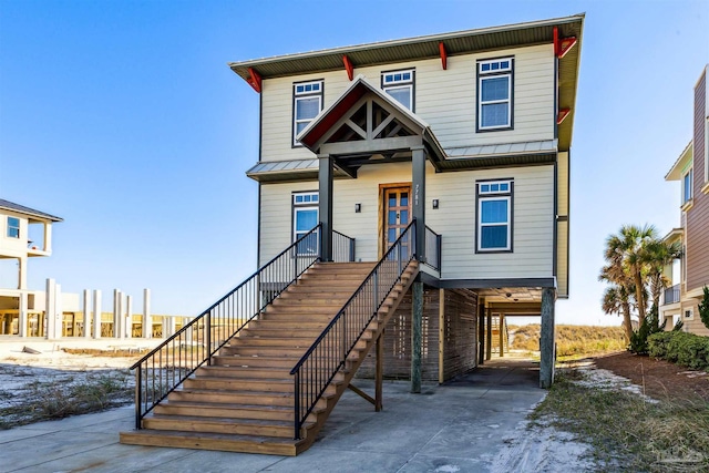 view of front of home featuring a carport