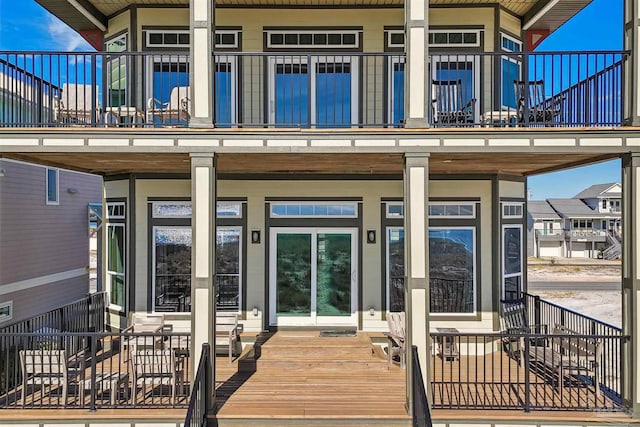 entrance to property featuring a balcony