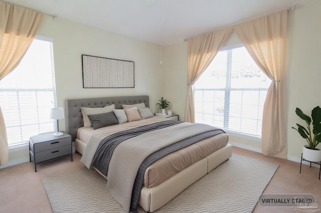 7101 Joy St Unit J5, Pensacola, FL 32504 - bedroom featuring light colored carpet and baseboards