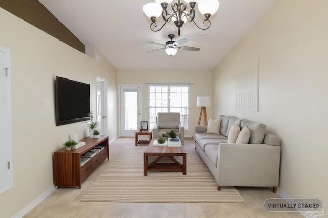 7101 Joy St Unit J5, Pensacola, FL 32504 - living area featuring a chandelier, baseboards, a ceiling fan, and lofted ceiling