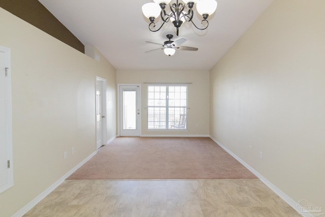 7101 Joy St Unit J5, Pensacola, FL 32504 - empty room with a chandelier, light colored carpet, and baseboards