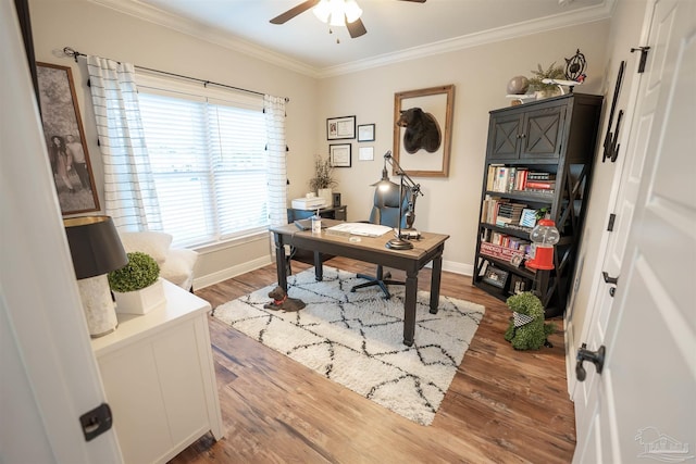 office featuring wood-type flooring, ceiling fan, and crown molding