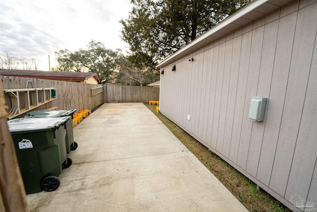 view of property exterior featuring a patio