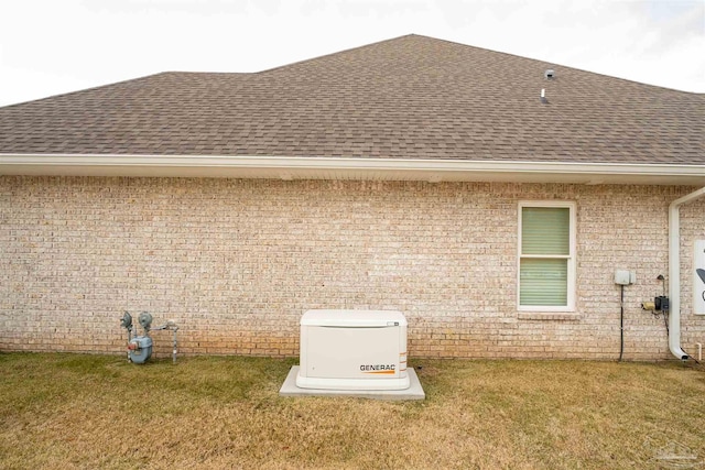 view of side of property featuring a lawn