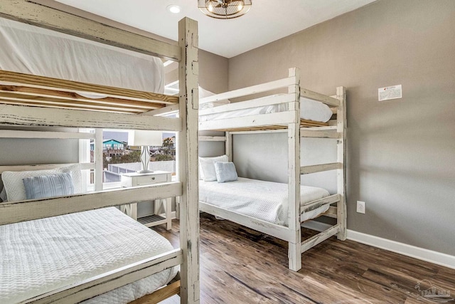 bedroom with hardwood / wood-style floors