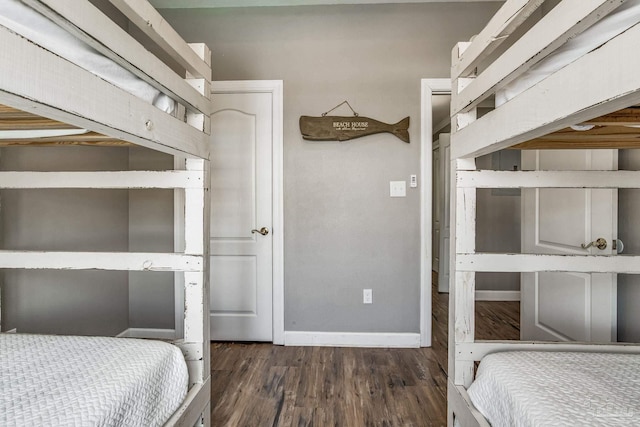 bedroom featuring dark wood-type flooring