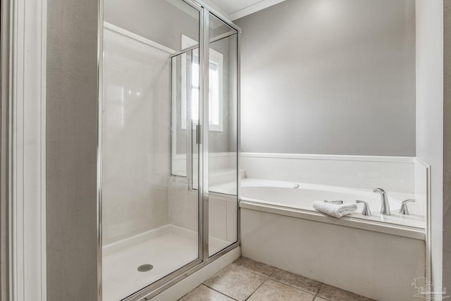bathroom featuring ornamental molding, tile patterned floors, and separate shower and tub