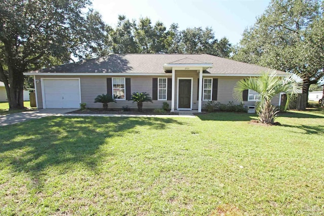 ranch-style house with a front yard and a garage