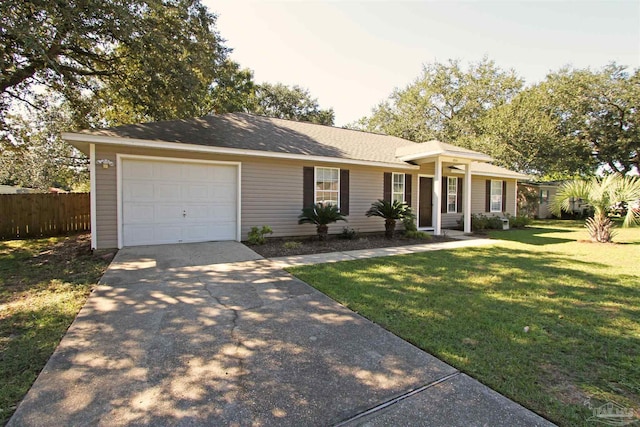 single story home with a garage and a front yard