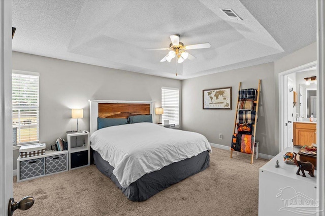 2863 Wallace Lake Rd, Pace, FL 32571 - bedroom featuring a textured ceiling, visible vents, multiple windows, and carpet