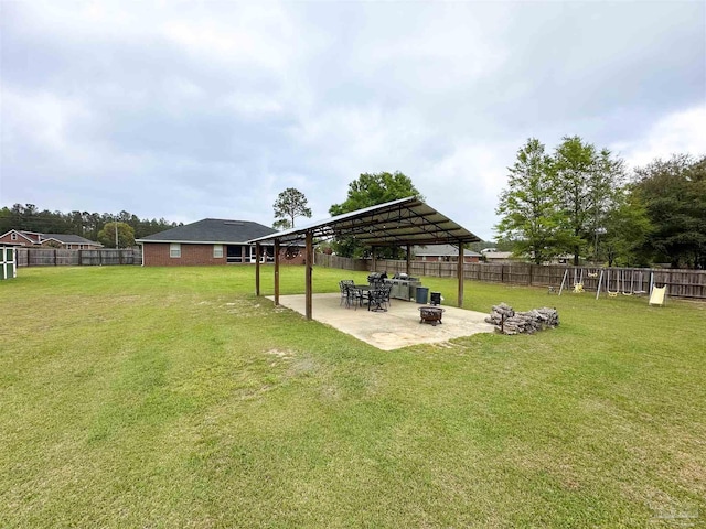 2863 Wallace Lake Rd, Pace, FL 32571 - view of yard featuring a fenced backyard, a gazebo, a patio area, and an outdoor fire pit