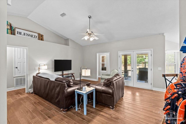2863 Wallace Lake Rd, Pace, FL 32571 - living room featuring french doors, a ceiling fan, wood finished floors, and lofted ceiling