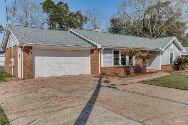 single story home with roof with shingles and brick siding