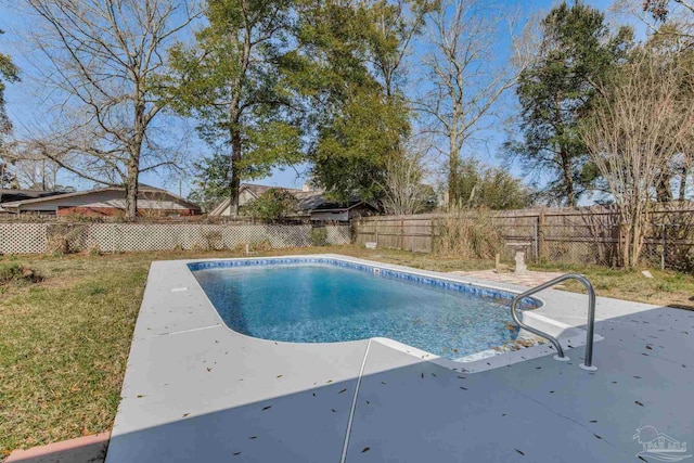 view of pool with a fenced in pool, a patio area, a yard, and a fenced backyard