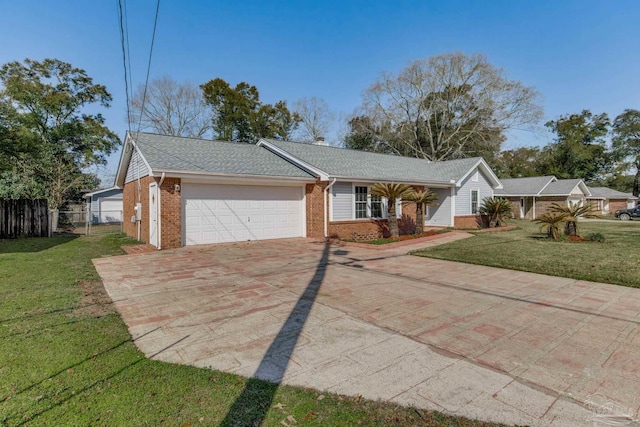 ranch-style house with a garage, brick siding, fence, driveway, and a front lawn