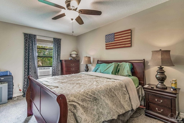 carpeted bedroom with ceiling fan, cooling unit, and a textured ceiling