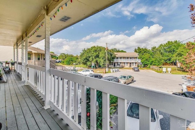 wooden deck with a porch