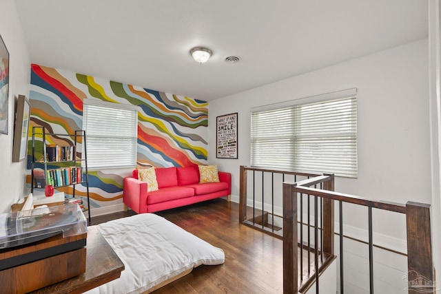 bedroom with hardwood / wood-style floors