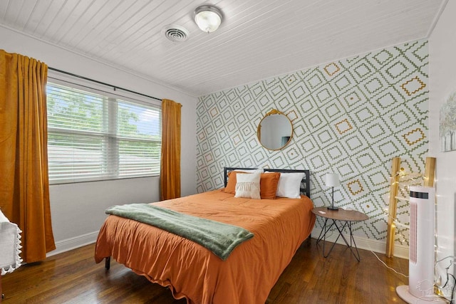 bedroom featuring dark hardwood / wood-style floors