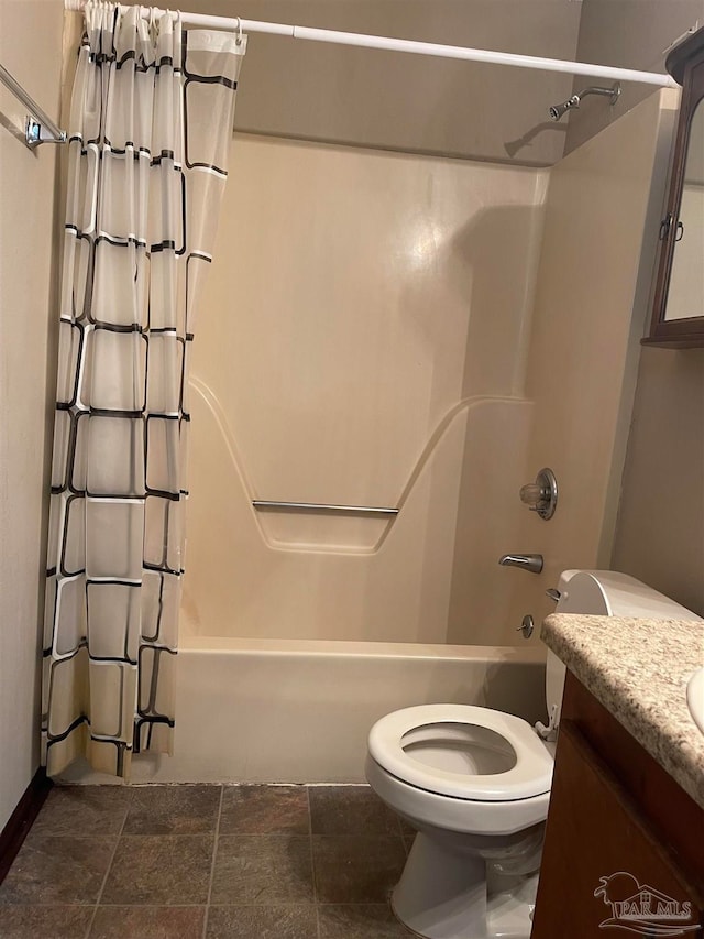 full bathroom with vanity, shower / tub combo, and toilet