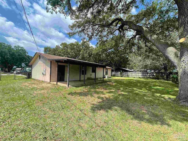 exterior space with a yard and a patio