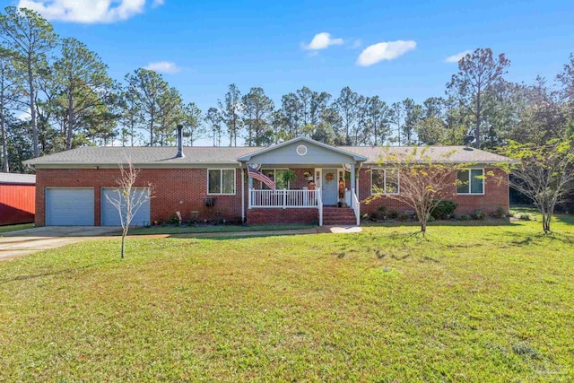 single story home featuring a front yard, a porch, and a garage