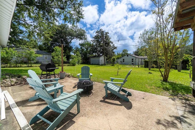 view of patio / terrace featuring a fire pit