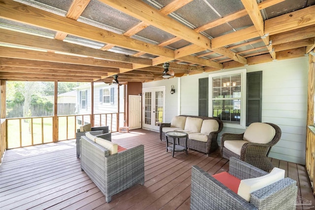 deck featuring french doors, ceiling fan, and an outdoor hangout area