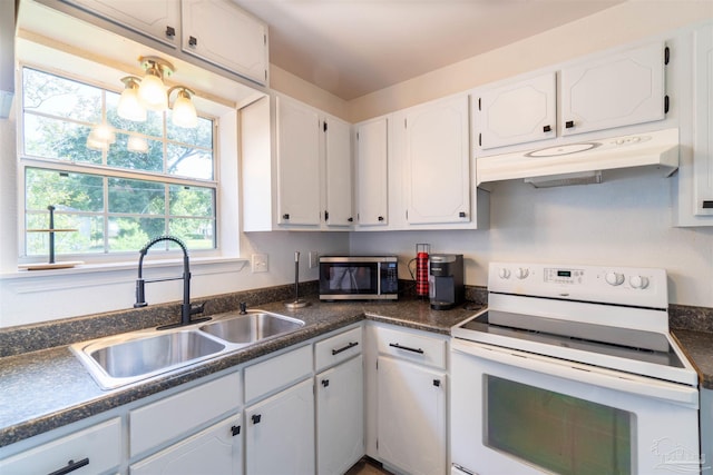 kitchen featuring white cabinetry, sink, and white range with electric stovetop