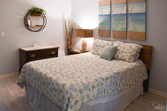 bedroom featuring light hardwood / wood-style floors