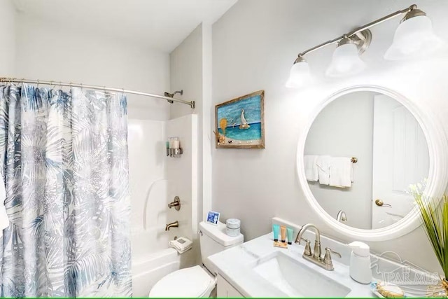 full bath featuring shower / bath combination with curtain, vanity, and toilet