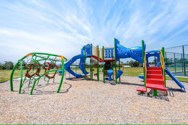 community jungle gym with fence