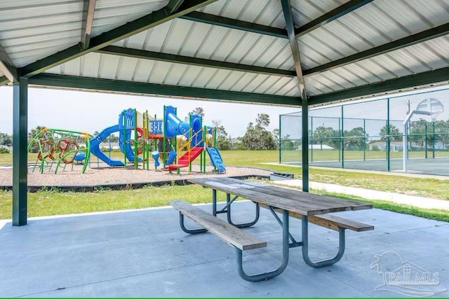view of community with fence and playground community