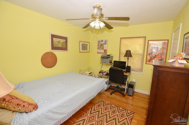 2153 Bergren Rd, Gulf Breeze, FL 32563 - bedroom featuring wood finished floors and ceiling fan