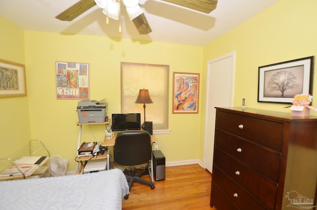 2153 Bergren Rd, Gulf Breeze, FL 32563 - bedroom featuring light wood-type flooring, a desk, and ceiling fan