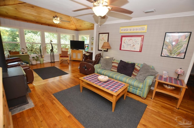 2153 Bergren Rd, Gulf Breeze, FL 32563 - living area featuring wood finished floors, a ceiling fan, wooden ceiling, and crown molding